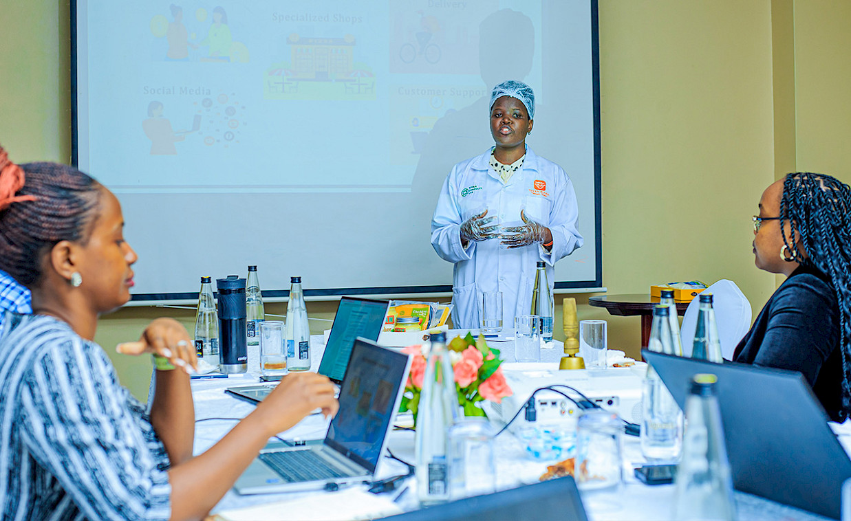 An entrepreneur makes a business presentation to judges during the Hi-Innovator programme pitch day.